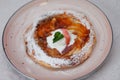 Apple pie on the plate with vanilla ice cream. Restaurant food. Traditional desert.