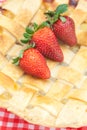 Apple pie and a strawberry Royalty Free Stock Photo