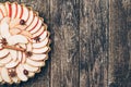 Apple pie tart on rustic wooden background. Ingredients - apples and cinnamon .Top view. Royalty Free Stock Photo