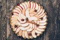 Apple pie tart on rustic wooden background. Ingredients - apples and cinnamon .Top view. Royalty Free Stock Photo