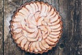 Apple pie tart on rustic wooden background. Ingredients - apples and cinnamon .Top view. Royalty Free Stock Photo