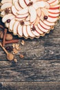 Apple pie tart on rustic wooden background. Ingredients - apples and cinnamon .Top view. Royalty Free Stock Photo