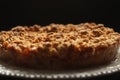 Apple, pie, tatsy. Selective focus of gluten free apple crisp pie on a dark background. Autumn concept. Royalty Free Stock Photo