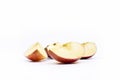 Apple pieces. Cut an apple into four parts. On a white background. Royalty Free Stock Photo