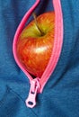 Apple in pocket, healthy lifestyle Royalty Free Stock Photo