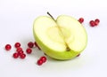 Apple with red bilberries Royalty Free Stock Photo