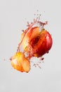 Apple and red juice splash Royalty Free Stock Photo