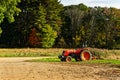 Apple red Kubota tractor