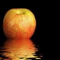 Apple reflected on water