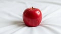 The apple s stem is short and brown centered atop the glossy surface Royalty Free Stock Photo