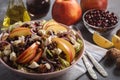 Apple salad with walnuts, pomegranate amd goat cheese. Royalty Free Stock Photo