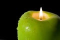 Apple-shaped candle Royalty Free Stock Photo