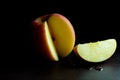 Apple and side of apple with moody and dark style and background Royalty Free Stock Photo