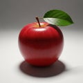 The apple sits on a neutral background casting a soft shadow beneath it Royalty Free Stock Photo