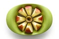 Apple slicer with apple. Royalty Free Stock Photo