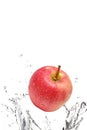 Apple splashing in water