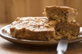 Apple sponge cake, walnuts, flour, sugar, oil and raisins.