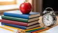 Apple On Stack Books With Pencils And Alarm Clock - Back To School Royalty Free Stock Photo