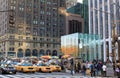 Apple Store cube and yellow cabs on 5th Avenue in New York City Royalty Free Stock Photo