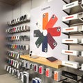 An Apple store display of colorful iPhone cases