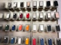 An Apple store display of colorful iPhone cases