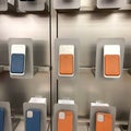 An Apple store display of colorful iPhone Magsafe Wallets