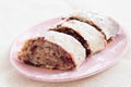 Apple strudel on rosa plate Royalty Free Stock Photo