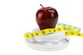 Apple, Tape Measure on Food Scale Royalty Free Stock Photo