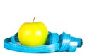 Apple and tape of measurements. Royalty Free Stock Photo