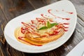 Apple tart with ice cream, jam and mint. Royalty Free Stock Photo