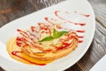 Apple tart with jam flouring with white powder. Royalty Free Stock Photo