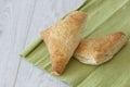 Apple turnover on a green tea towel Royalty Free Stock Photo