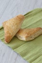 Apple turnover on a green tea towel Royalty Free Stock Photo