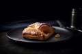 Apple turnover with a touch of cinnamon on a modern black plate, chaussons aux pommes, French puff pastry Generative AI