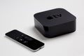 Apple TV 4th generation with remote Royalty Free Stock Photo