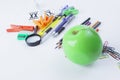 Apple and variety of school supplies on white background.photo with copy space Royalty Free Stock Photo