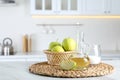 Apple vinegar and baking soda on white marble table in kitchen. Eco friendly natural detergents