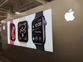 Apple Watch Ad on Wall Featuring Apple Logo