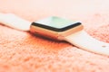 Apple Watch Gold on a soft fluffy peach-colored background