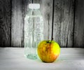 Apple with water bottle for training Royalty Free Stock Photo