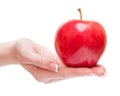 Apple on woman hand Royalty Free Stock Photo