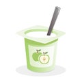 Apple yogurt with spoon inside