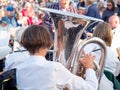 APPLEDORE, DEVON, ENGLAND - AUGUST 29 2021: Woman playing the tuba in a brass band, outdoors. Royalty Free Stock Photo