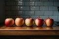 Apples arranged neatly on a kitchen table, captured beautifully