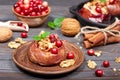Apples baked with walnuts, cranberries and cinnamon Royalty Free Stock Photo
