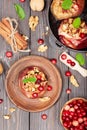 Apples baked with walnuts, cranberries and cinnamon Royalty Free Stock Photo