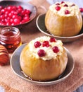 Apples baked with cheese and cranberries poured honey. Healthy breakfast. Royalty Free Stock Photo