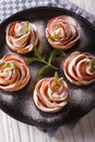 The apples baked in the shape of roses vertical top view Royalty Free Stock Photo