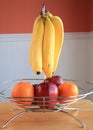 Apples and bananas and oranges fruit bowl Royalty Free Stock Photo