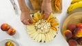 Fruit platter, peaches, apples, and banana slices, close up on white background Royalty Free Stock Photo